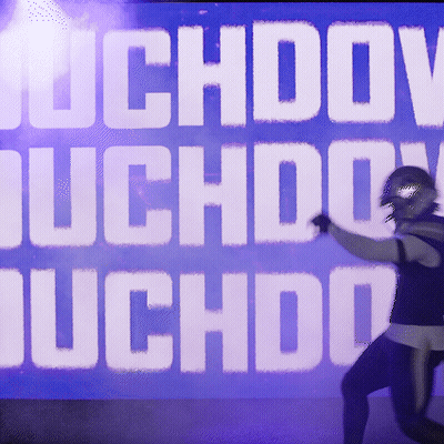 Football Player Running In Front Of Suchdov Suchdo Sign GIF