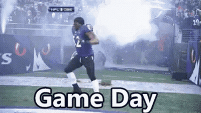 Football Player Running In Purple Uniform GIF