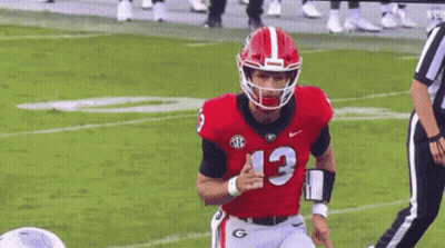 Football Player Running In Red And White GIF