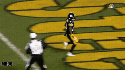 Football Player Running Near Mr96 Sign GIF