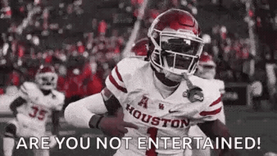 Football Player Running On Field With Crowd GIF