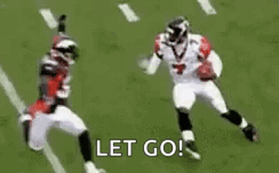 Football Player Running Toward Player On Ground GIF