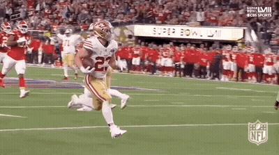 Football Player Running With Ball During Super Bowl GIF