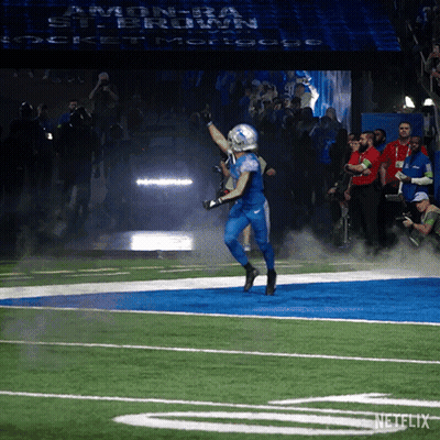 Football Player Running With Netflix GIF