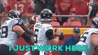 Football Player Saying I Just Work Here Holding Ball GIF
