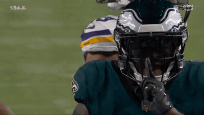 Football Player Shushing With Finger To Mouth GIF