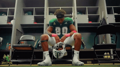 Football Player Sits In Locker Room Number 80 GIF