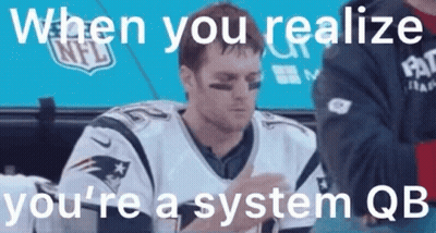 Football Player Sitting In Dugout Looking At Phone GIF