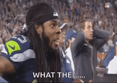 Football Player Sitting In Stands Saying What The GIF