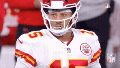 Football Player Sitting On Sidelines GIF