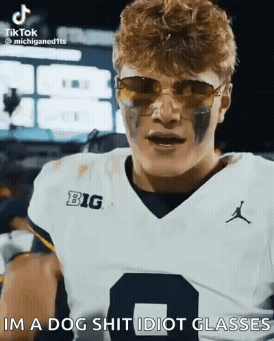 Football Player Sunglasses Big Shirt Says Im A Dog Shit Idiot Glasses GIF