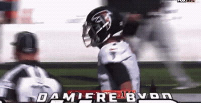 Football Player Talking To Referee GIF