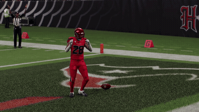 Football Player Tying Shoes On Field GIF