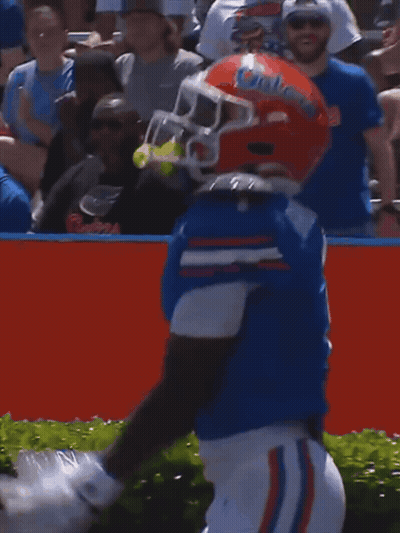 Football Player Wearing Gators Helmet GIF