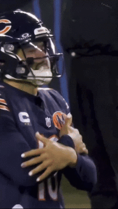 Football Player Wearing Helmet And Number 10 Jersey GIF