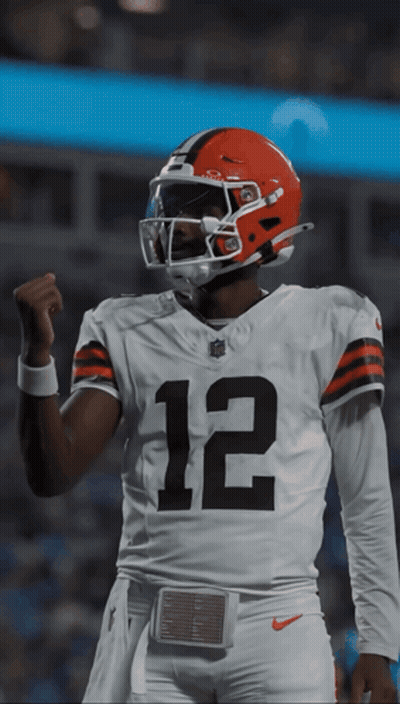 Football Player Wearing Helmet And Number 12 Jersey GIF