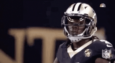 Football Player Wearing Helmet And Sunglasses GIF