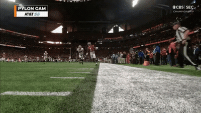Football Player Wearing Helmet Number 18 GIF
