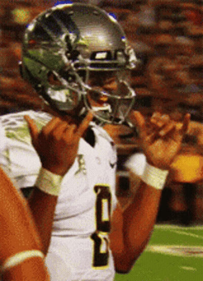 Football Player Wearing Helmet Number 5 GIF