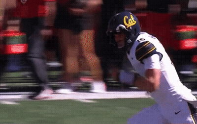 Football Player Wearing Helmet With Cal GIF