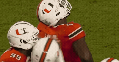 Football Player Wearing Helmet With L GIF