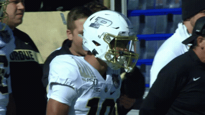 Football Player Wearing Helmet With P GIF