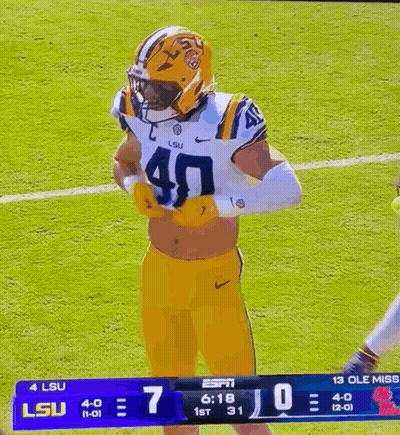 Football Player Wearing LSU Helmet GIF