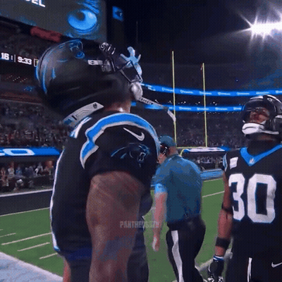 Football Player Wearing Mask With Number 4 GIF