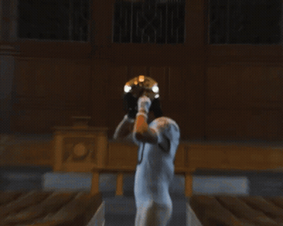 Football Player Wearing Nike Helmet GIF