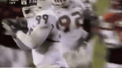 Football Player Wearing Number 99 Jersey GIF