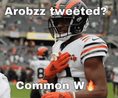 Football Player Wearing Orange Gloves GIF