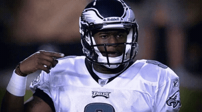 Football Player Wearing Riddell Helmet GIF