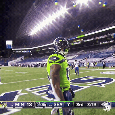 Football Player Wearing Santa Hat Number 41 GIF