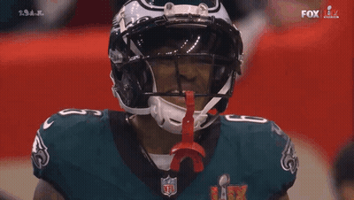 Football Player Wearing Super Bowl Helmet GIF