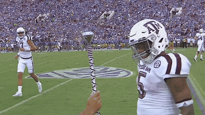 Football Player Wearing Texas A&M Helmet GIF