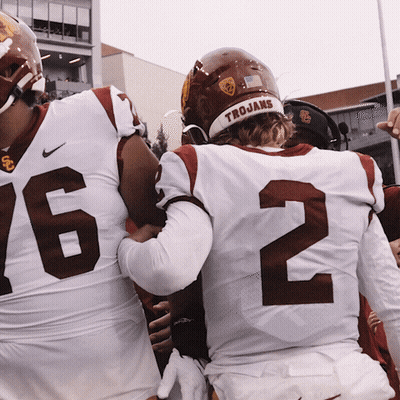 Football Player Wearing Trojans Helmet GIF