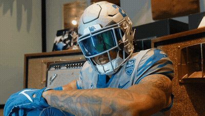 Football Player Wearing UCSD Helmet GIF