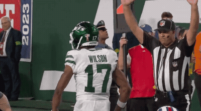 Football Player Wilson 17 Next To Referee GIF