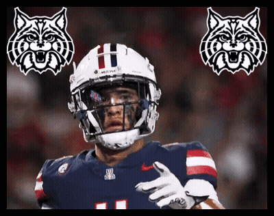 Football Player With H Helmet And Bobcats Logos GIF
