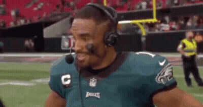 Football Player With Headphones And Headset Talking GIF