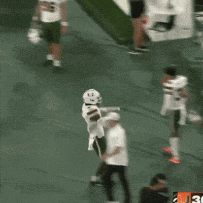 Football Player With Helmet Letter G Jumping GIF