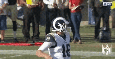 Football Player With Helmet Number 18 GIF