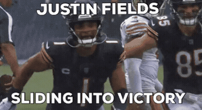 Football Player With Justin Fields Sliding Into Victory GIF