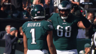Football Player With Number 1 Talking To Another GIF