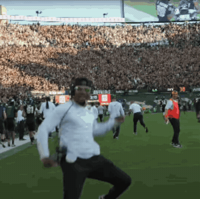 Football Player With T On Helmet GIF