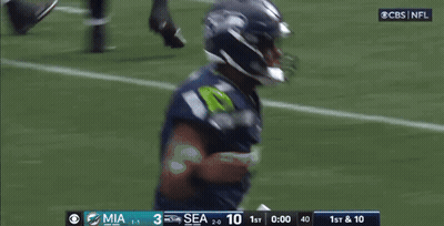 Football Player With Touchdowns Background GIF