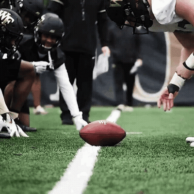 Football Player With W Helmet GIF