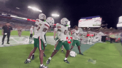 Football Players Celebrating Touchdown GIF