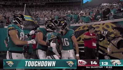 Football Players Celebrating Touchdown GIF