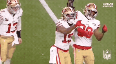 Football Players Celebrating Touchdown GIF
